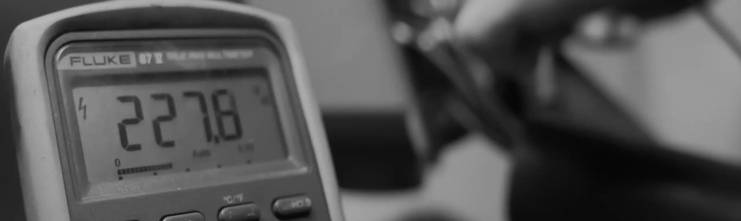 Electrical test meter during motor inspection